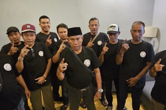 Moch Arief, Ketua Tretan Dhibik Surabaya Utara saat ditemui di luar arena debat publik di Hotel Grand Mercure, Surabaya.