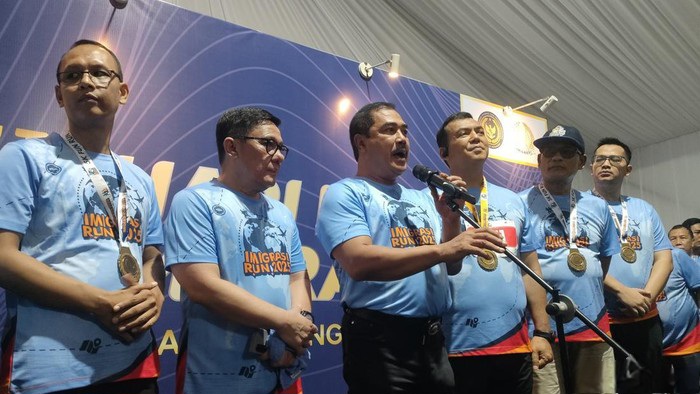 Menteri Imigrasi dan Pemasyarakatan RI Agus Andrianto dan jajaran saat peringatan Hari Bakti Imigrasi ke-75 di GBK, Minggu 19 Januari 2025.