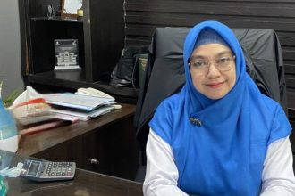 Kepala BPJS Kesehatan Cabang Surabaya Hernina Agustin Arifin
