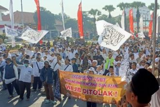 Ribuan massa menggelar aksi di sepanjang Jalan Pemuda, mereka menolak LGBTQ dan mendesak pemerintah tegas.